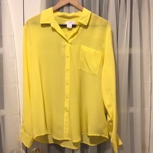 Yellow silk long sleeve button down blouse.